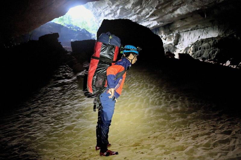 Vietnamese porter Ho Minh Phuc in Son Doong cave.