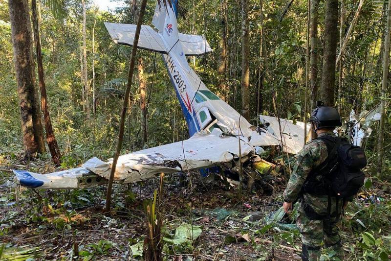 Search and rescue teams of Colombian Army conduct operation at the scene after a plane crashed in the jungle in Colombia on May 19, 2023.
