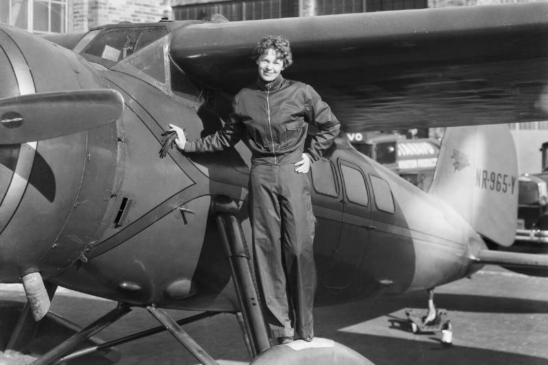 Amelia Earhart Next to Aircraft