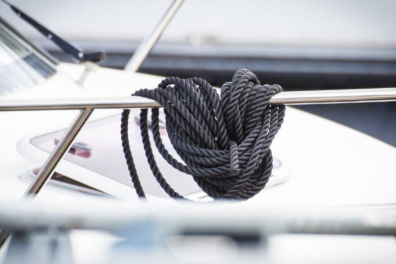Black rope as part and detail of yacht..