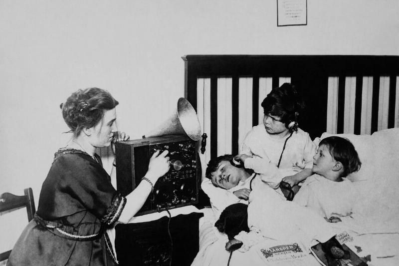 Children Listening To The Radio In London