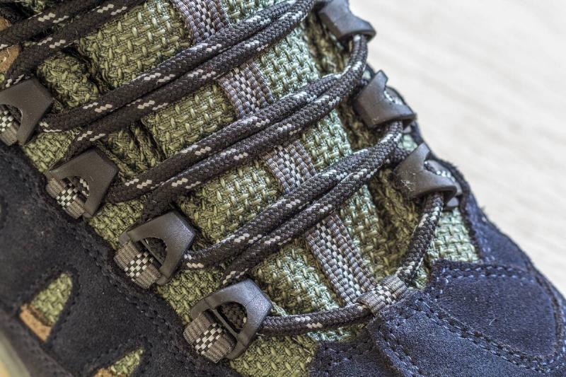 Hiking boots laced with paracord. 