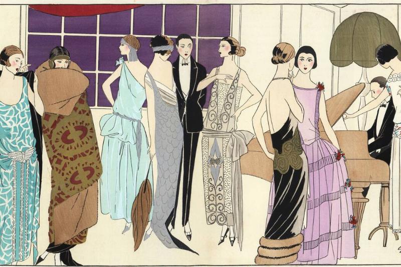 Fashionable party with man in tuxedo playing a grand piano