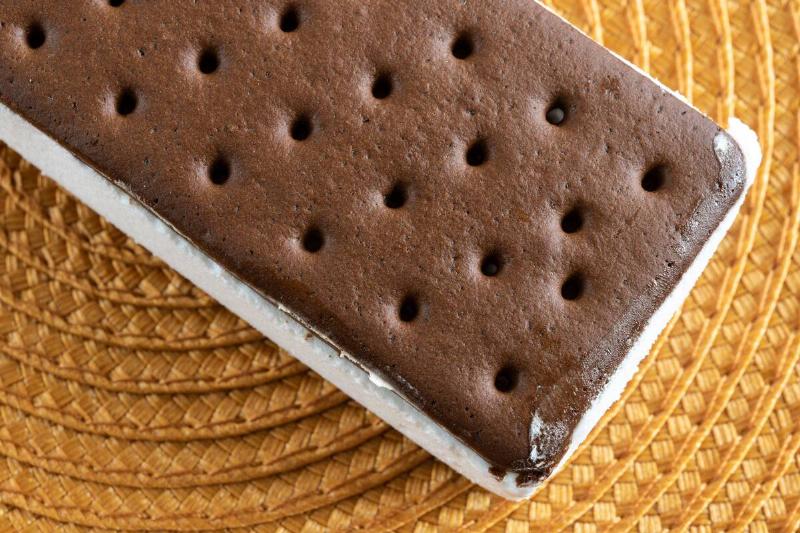 Ice cream sandwich with vanilla flavor in the center and...