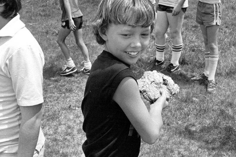 MAY 23 1984; Chris Stiner shows how to throw a cow chip that is large and flat.;