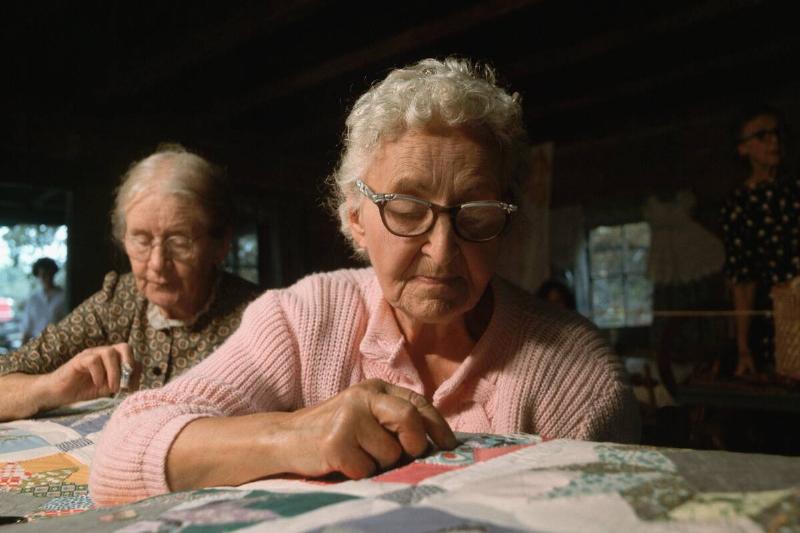 Quilting Bee Working at Festival