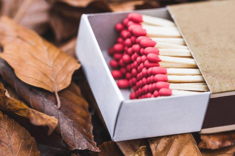 Red match heads in box.
