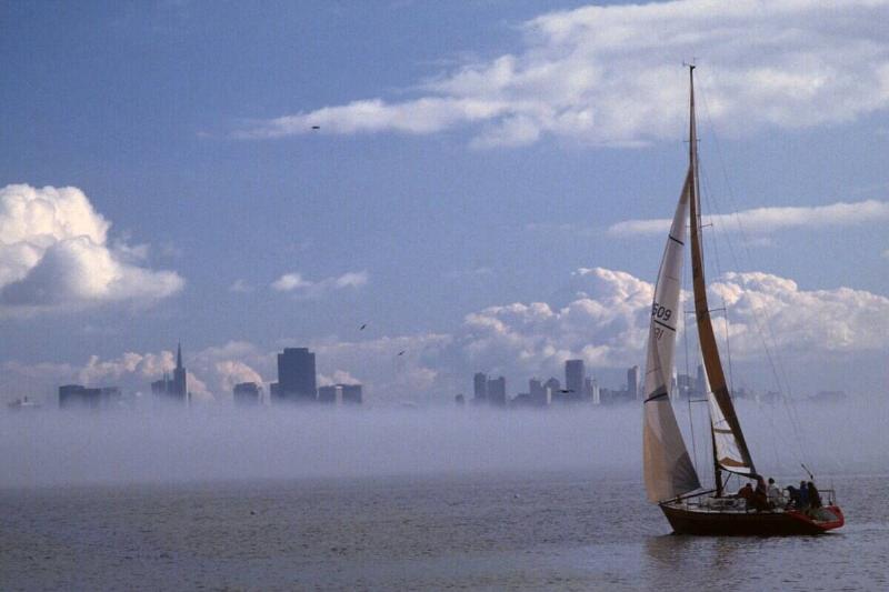 Sail Boat And Skyline With Fog