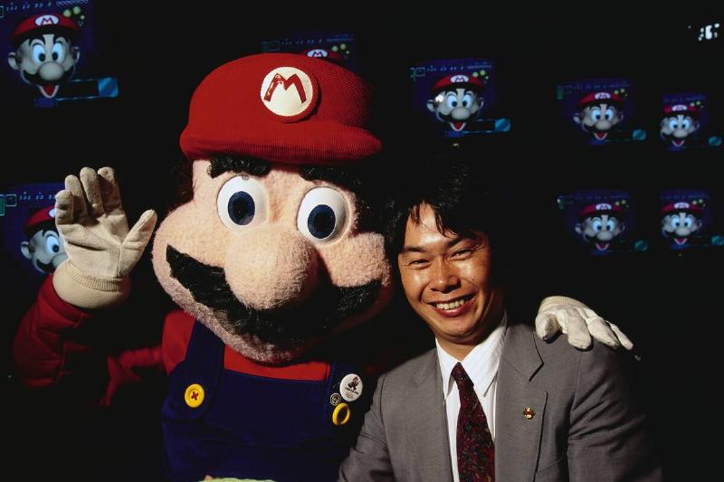 Shigeru Miyamoto with Mario