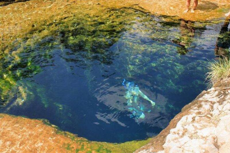 A swimmer at Jacob's Well.