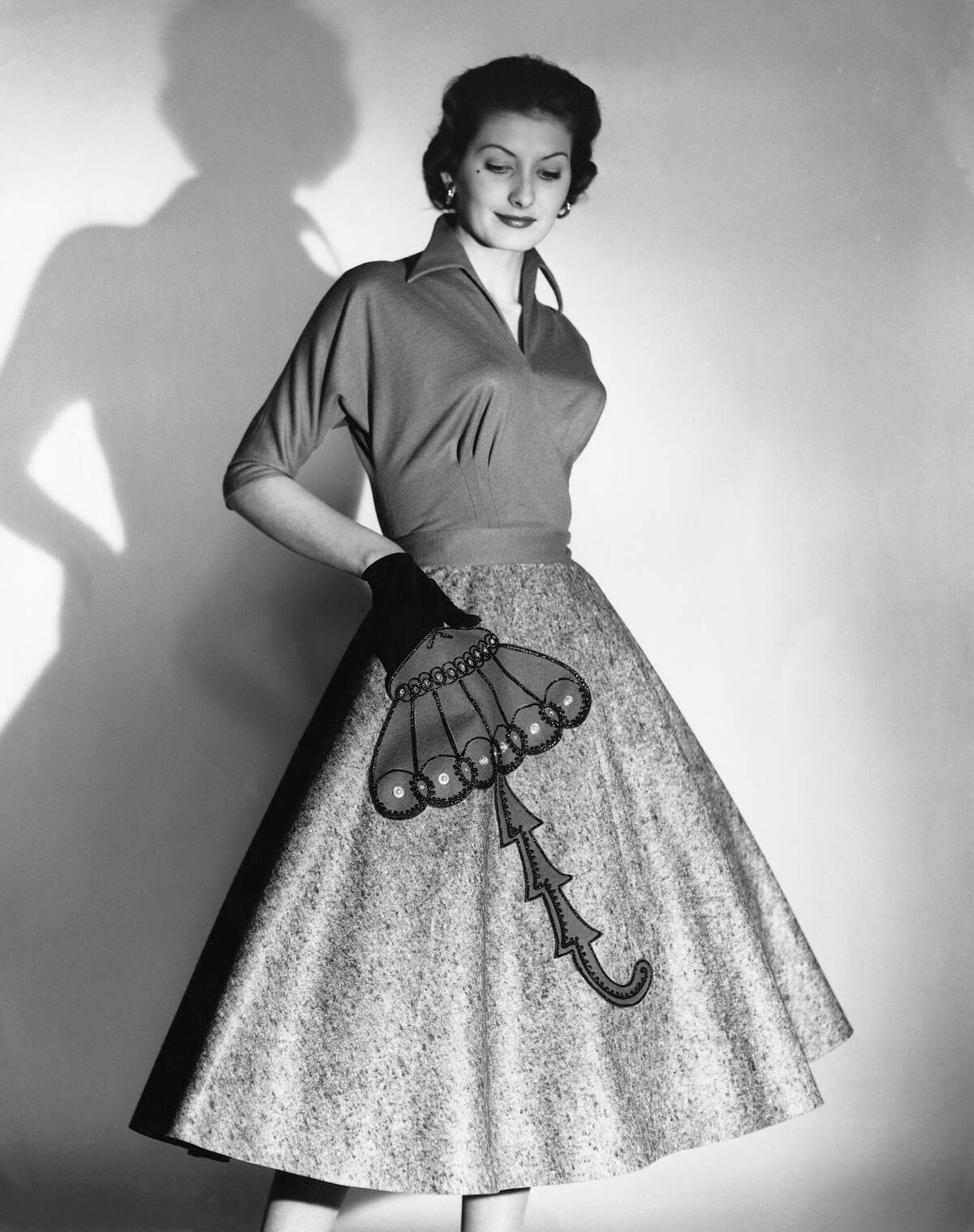 Women Modeling Umbrella-Pocketed Skirt