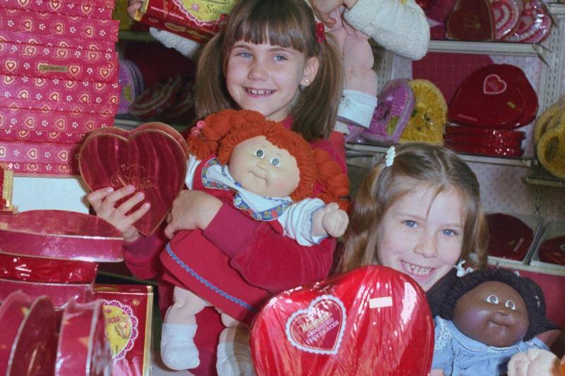 Young Customers Buying Cabbage Patch Kids with Candy