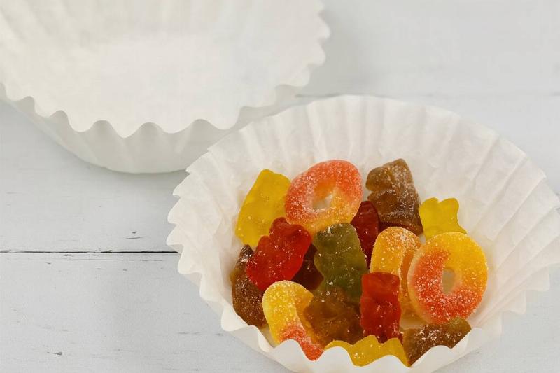 Coffee filter used as a bowl for candy. 