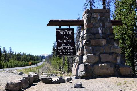 Entry sign at the North Entrance to Crater Lake National Park Oregon.