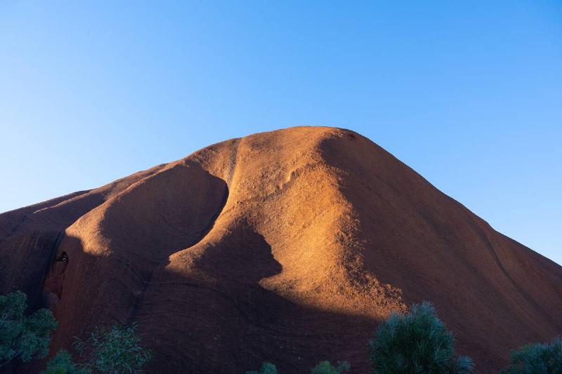 Uluru in afternoon sun.