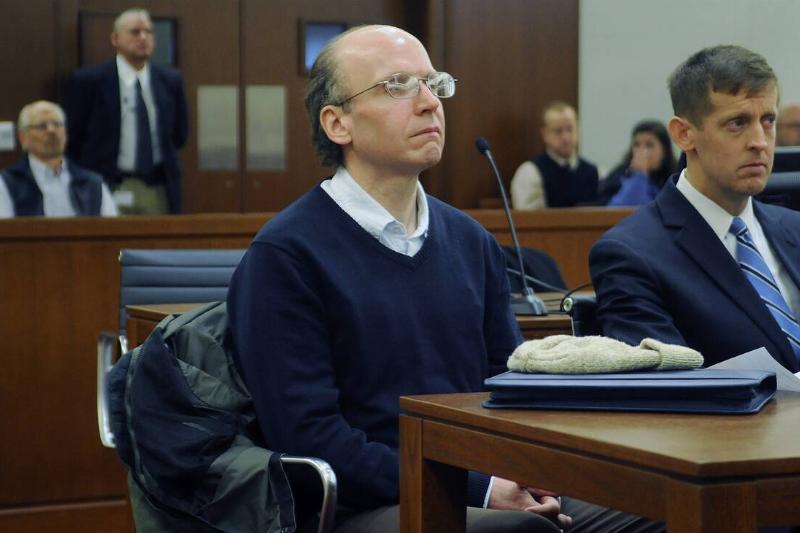 Christopher Knight, center, sat Monday March 23, 2015 silently during his graduation from the Co-Ocurring Disorders Court in Augusta.
