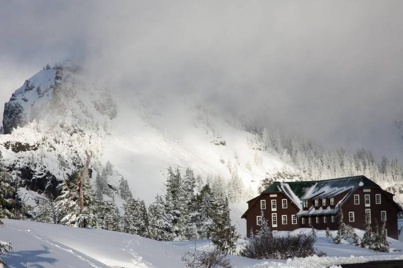 A blizzard storms the peripheral of Crater Lake in late May