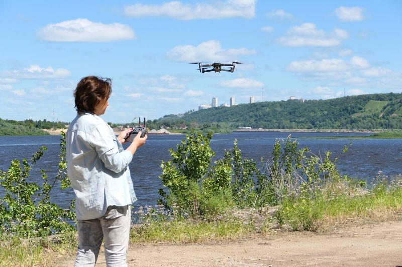 A drone pilot using a drone. 