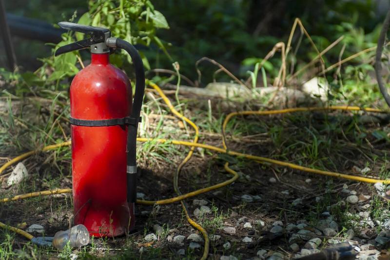 Fire extinguisher outside.