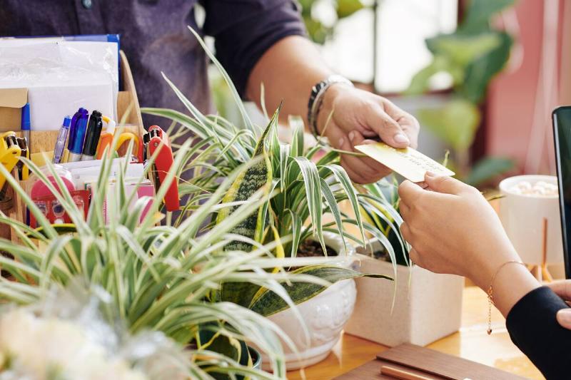 Paying for purchase using a card.