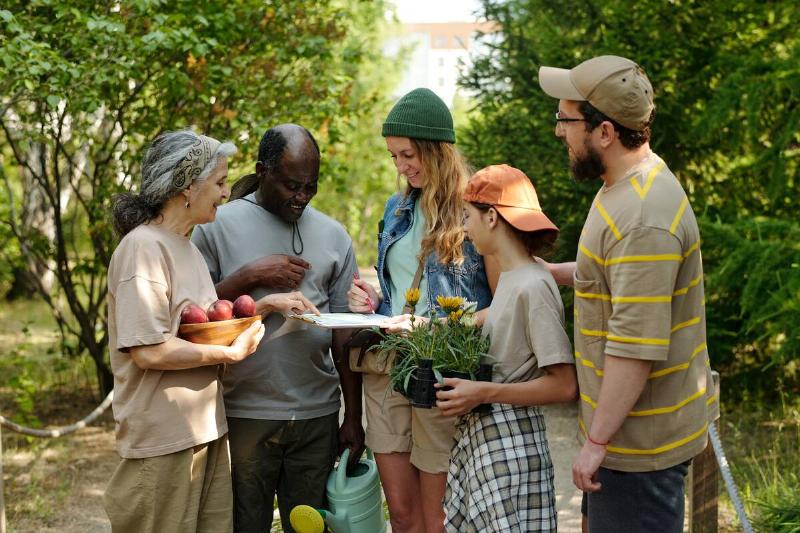 Group of adults learning about plants together. 
