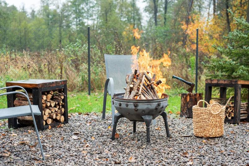 Burning wood in a backyard fire. 