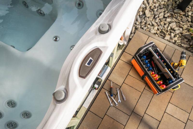 Hot tub and tool kit. 