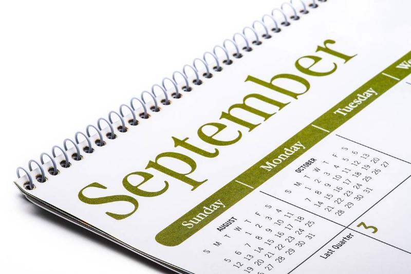 Desk top calendar September close up on a white background.