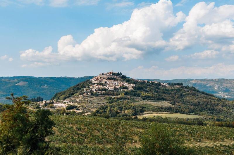 A small, walled-city in the countryside.