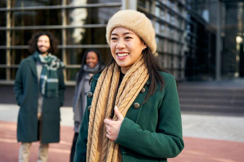 Woman wearing warm layers.