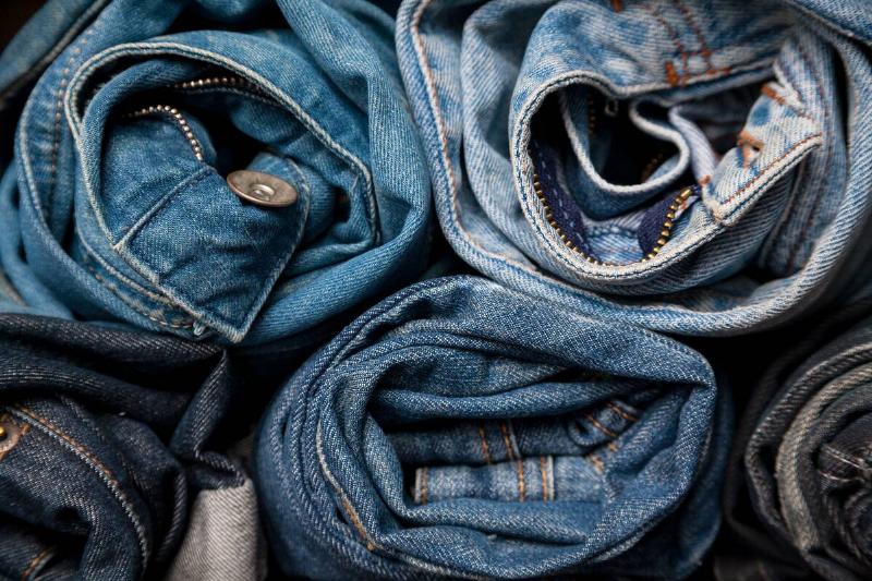 Stack of rolled jeans.