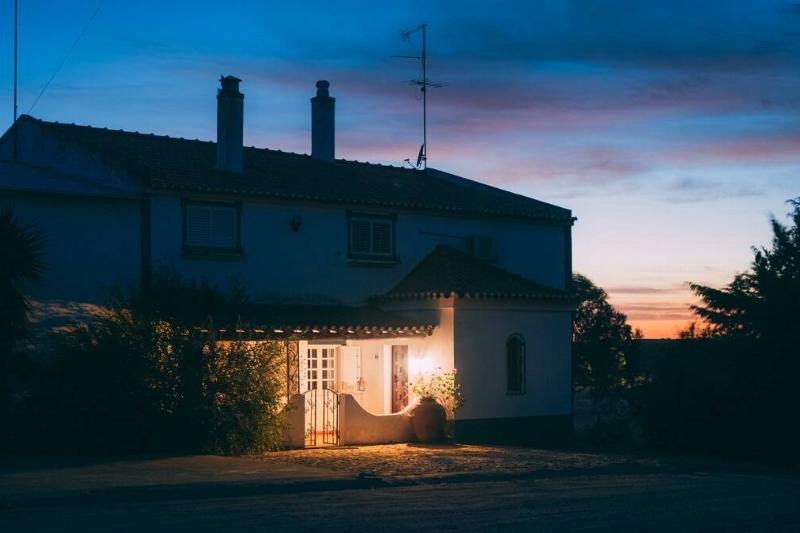 Bright light by front door of house. 