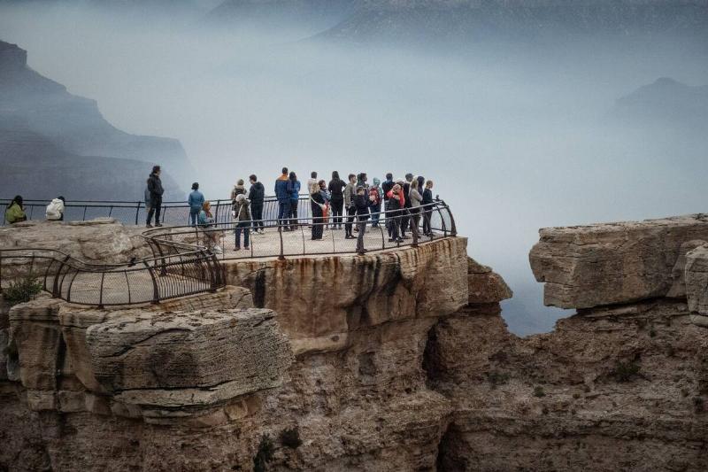 Smoke from the Dragon Bravo fire settles into the Grand Canyon along the South Rim at Mather Point on July 17, 2025 in Grand Canyon, Arizona.