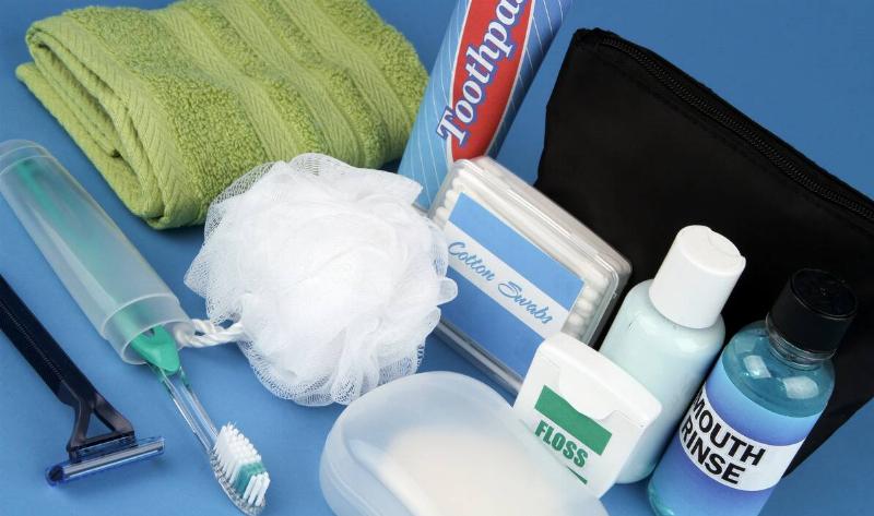 A collection of small, standard travel toiletries.