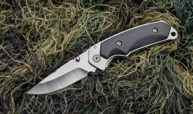 A  pocket knife on a gillie suit.