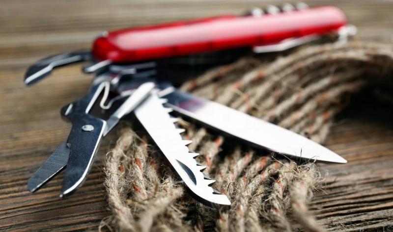 An unfolded, fanned out multi tool.