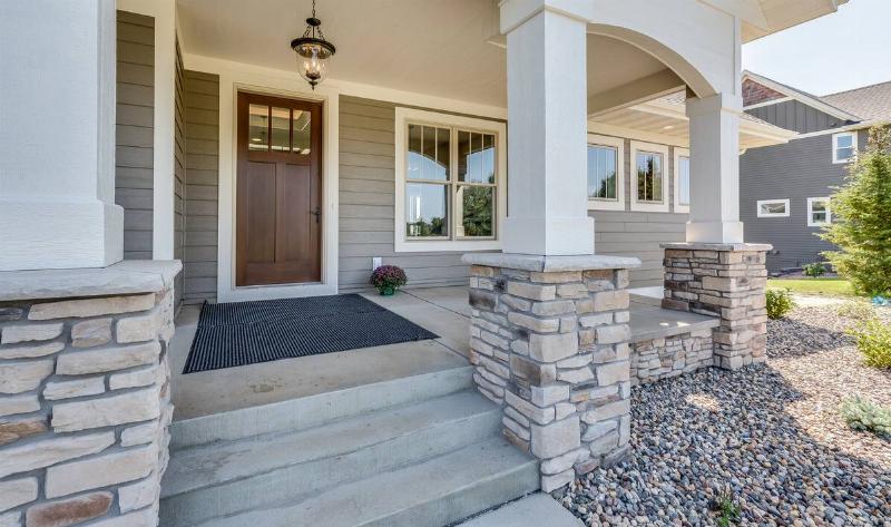 A home's concrete front steps and porch.