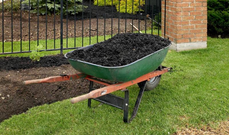 A wheelbarrow full of dirt.