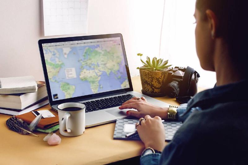 Young person typing on the computer.