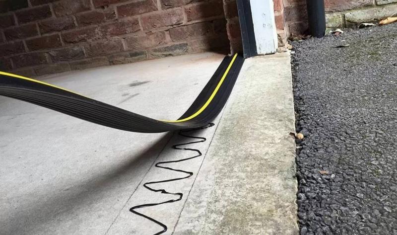 A threshold seal being installed.