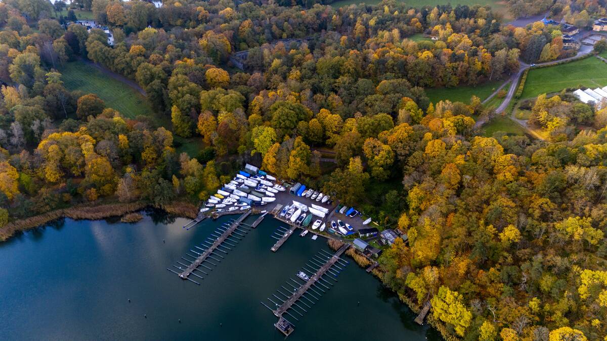 A view of the Hagaparken as the vivid colors of autumn spread across the cityscape of Stockholm, Sweden on October 21, 2025. Trees across the capital transformed into hues of red, orange, and gold, reflecting off the calm waters surrounding the city.