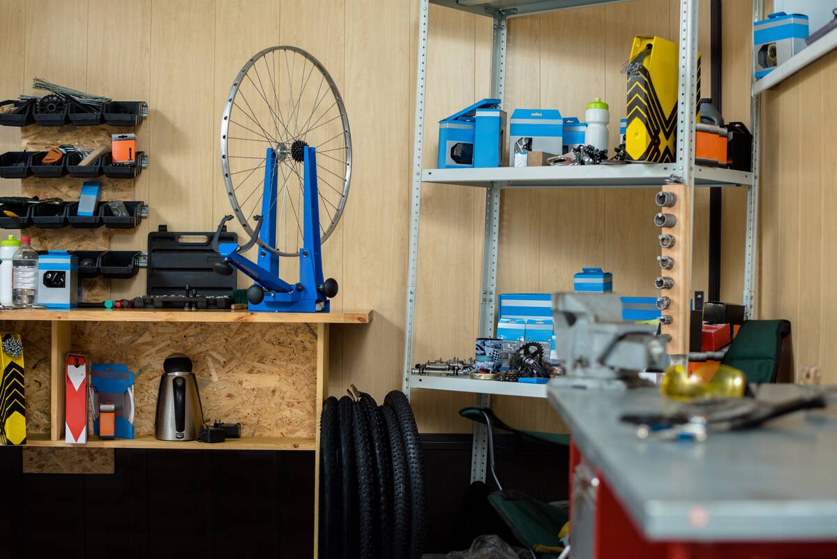 Empty bicycle repair workshop with necessary tools and spare parts
