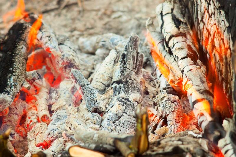 Wooden burning embers beautifully glowing. close up photography.