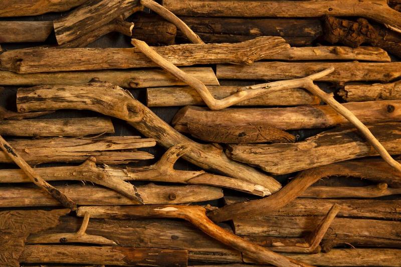 Abstract wooden background made of short sticks.