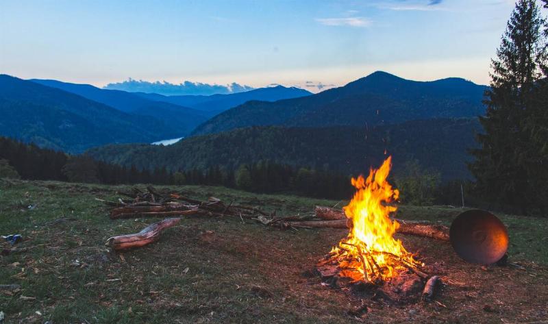 A campfire in a field.