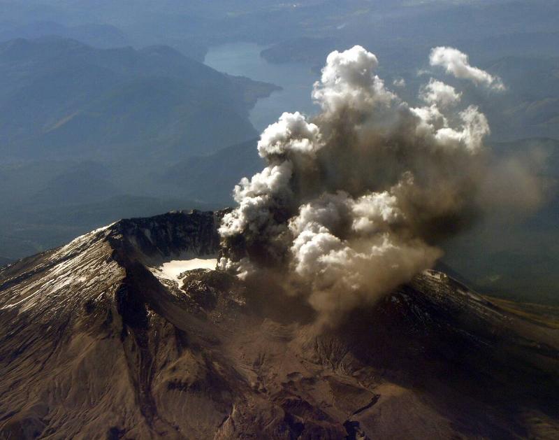 Mount St. Helens emits a plume of steam and ash October 1, 2004 in the Mount St. Helens National Monument, Washington.