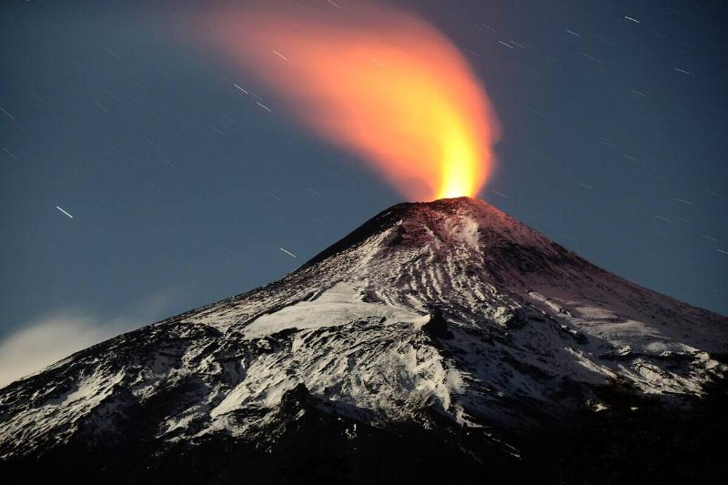 View of the Villarrica volcano, one of Chile's most active, taken from  Pucon, some 800 km south of Santiago, showing visible signs of activity 
on May 6, 2015.