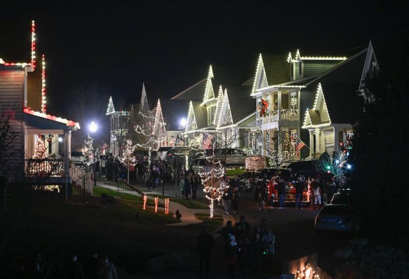 Named Christmas town USA the small town awaits visitors from all over  the world with about a half a million lights while some enjoy driving 
through, others stroll along in McAdenville, United States on December 
7, 2024.