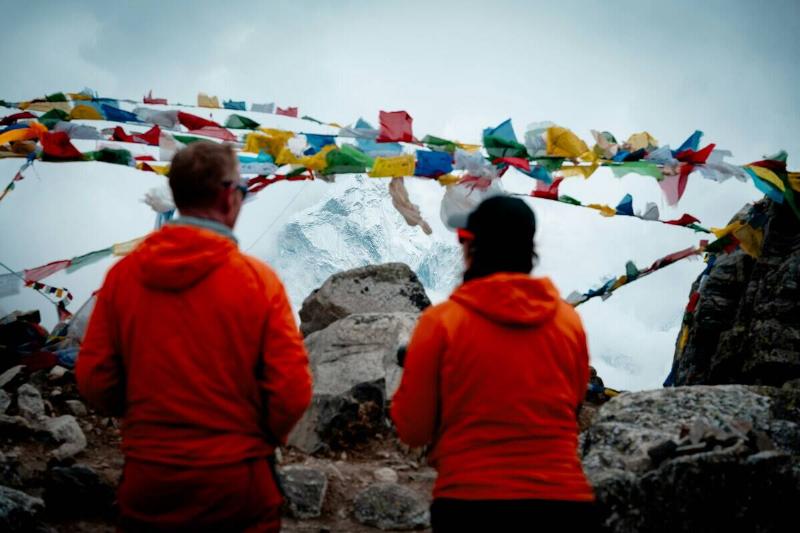 People admiring the scenery from a Mount Everest base camp.