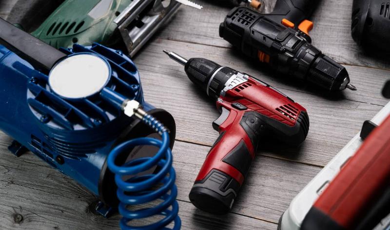 Power tools on a workbench.